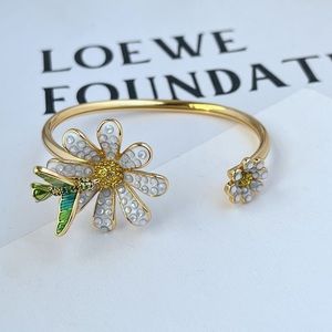 kate spade Gold and White Flower Bracelet